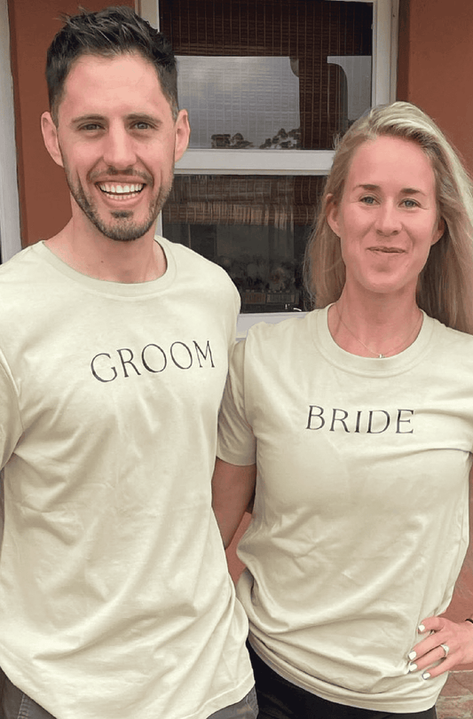 Models wear Bride and Groom T-shirts in a khaki colour