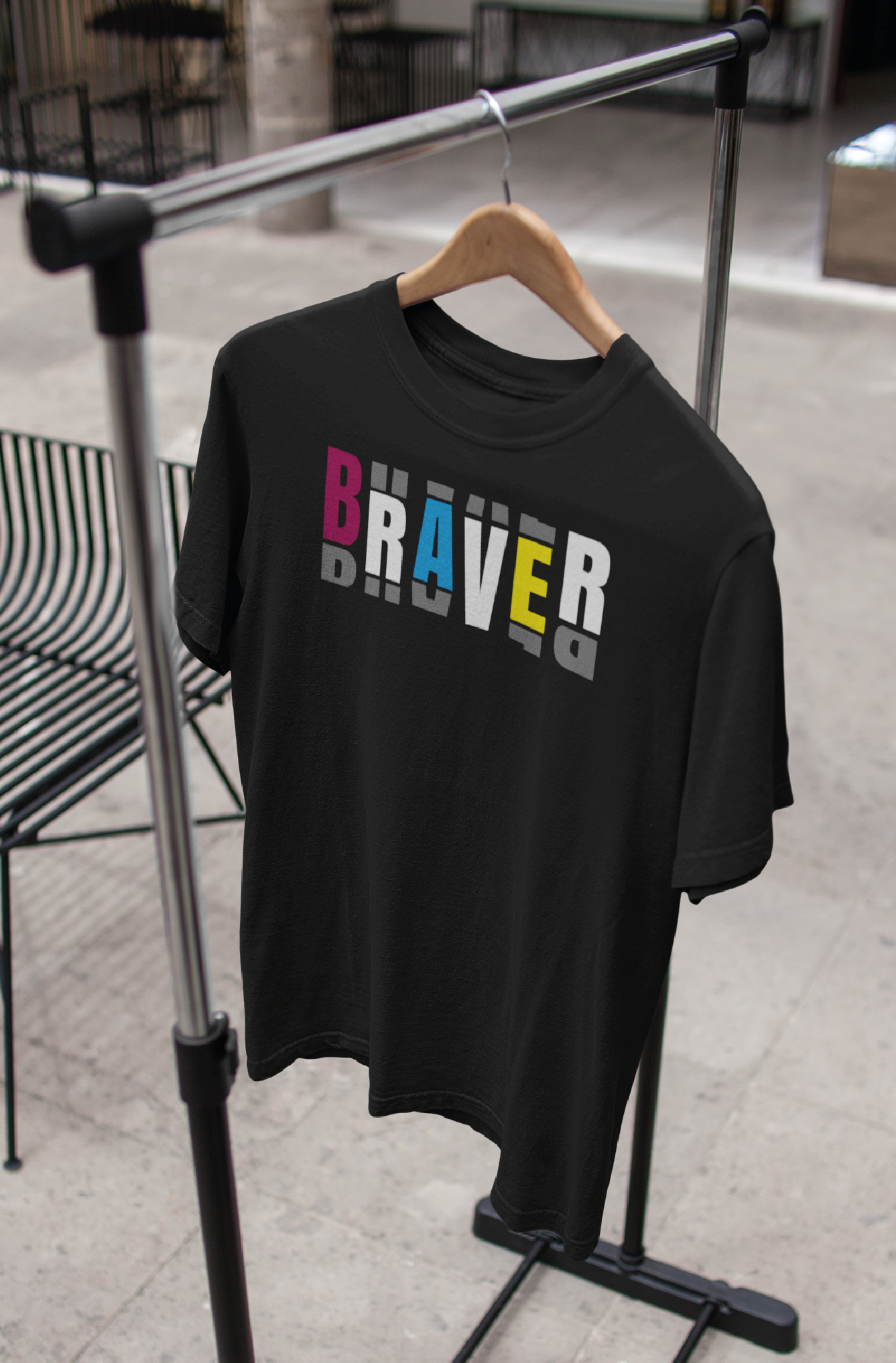 black unisex tshirt on hanger with graphic print