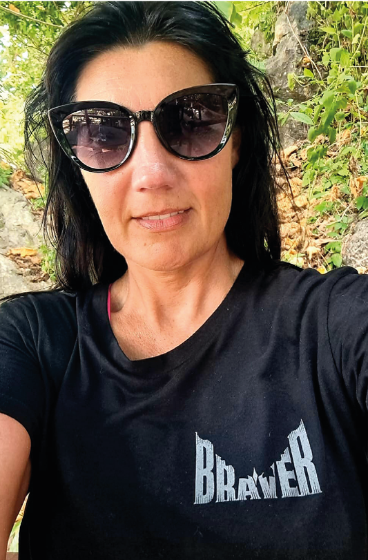 A friend in Thailand wears the Braver Family Crest print on a black unisex t-shirt
