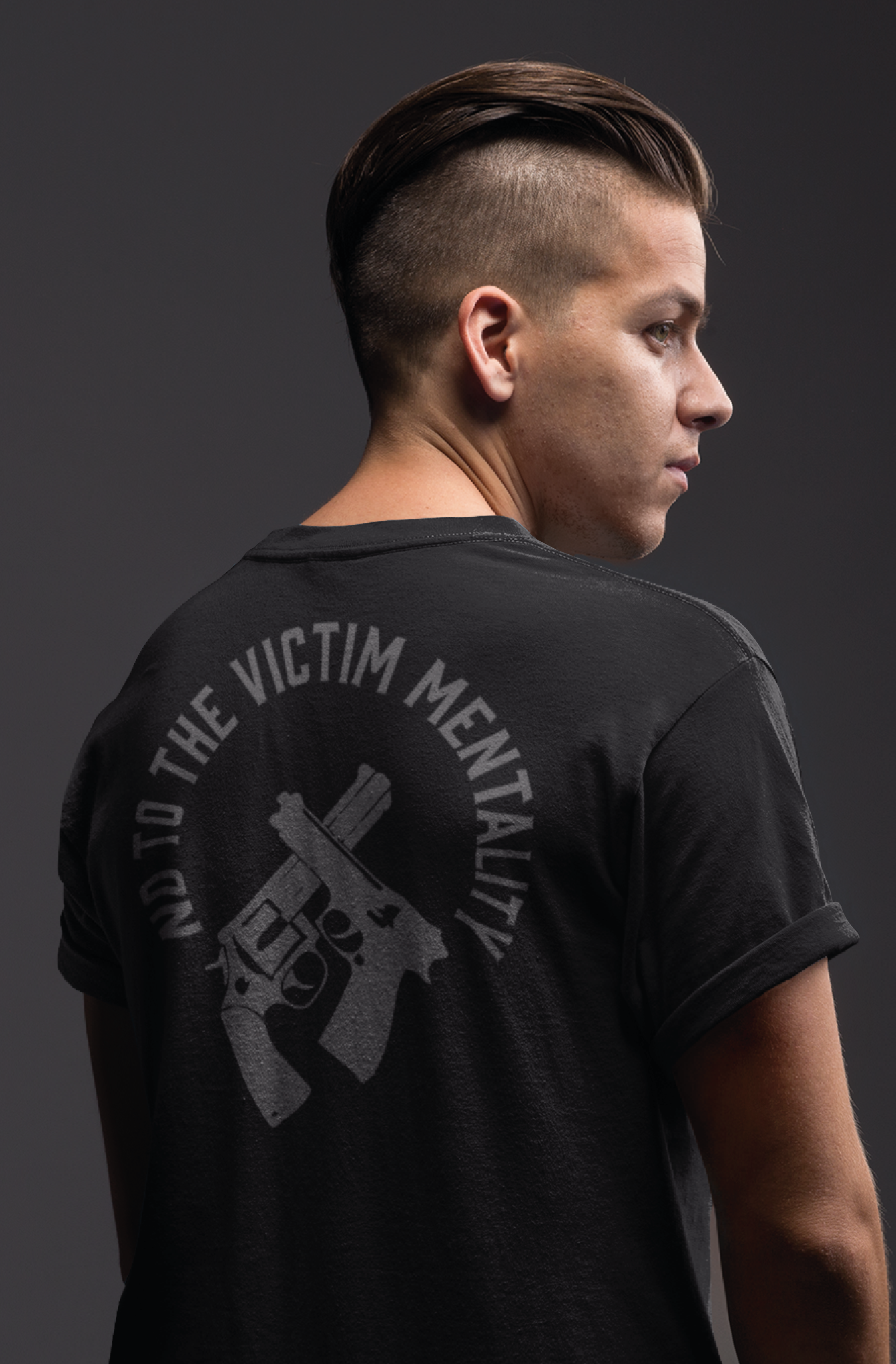 Man wearing not a victim mentality print on black tshirt