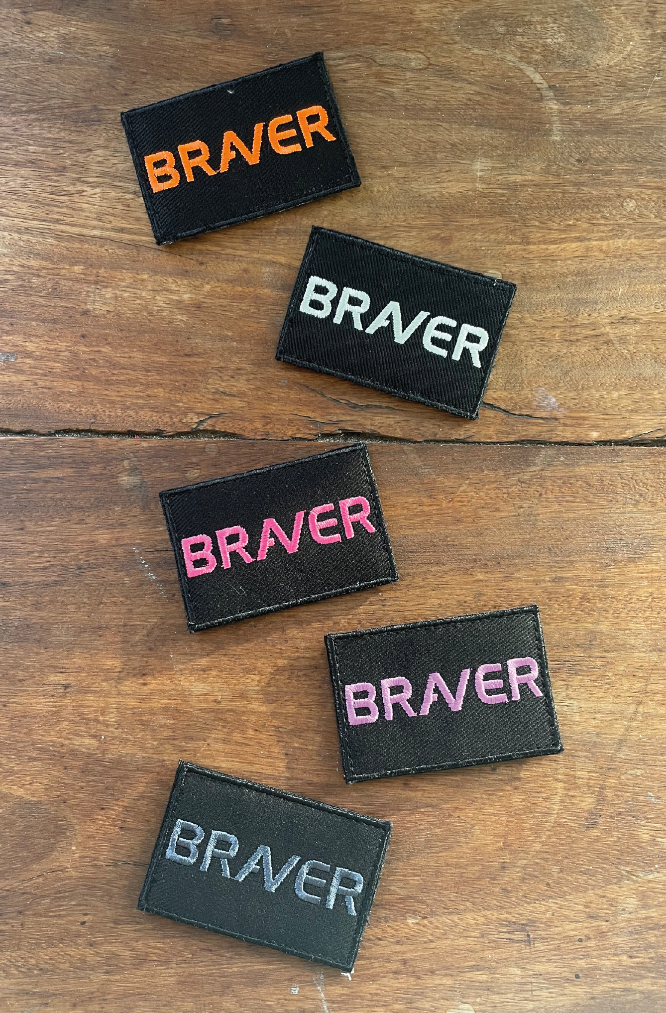 Velcro patches in a variety of colors with the word BRAVER