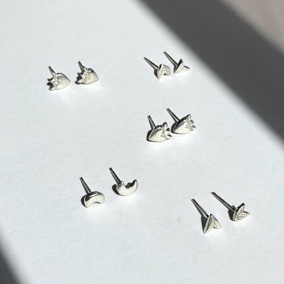 variety of earring studs in sterling silver